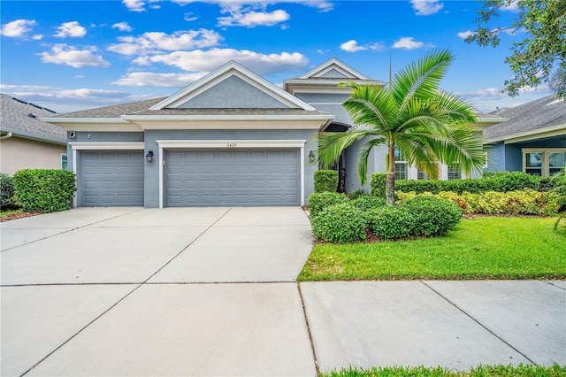 view of front of property featuring a garage