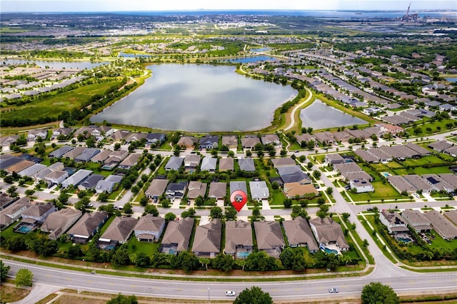 drone / aerial view with a water view