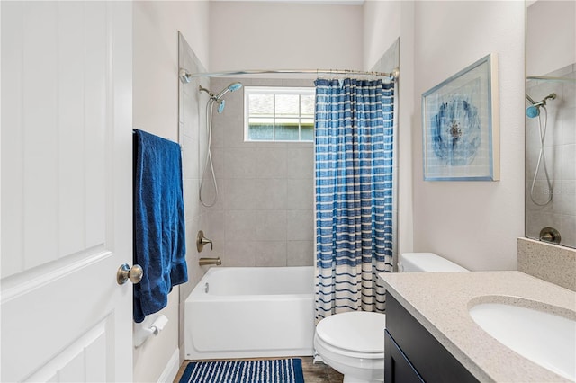 full bathroom with vanity, toilet, and shower / tub combo with curtain