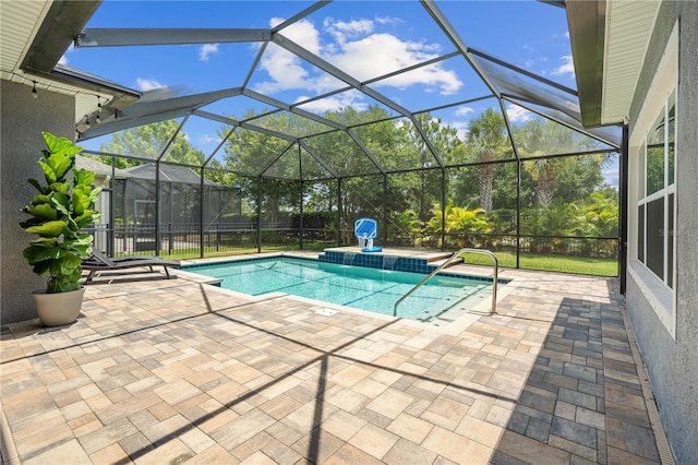 view of pool featuring a lanai and a patio area