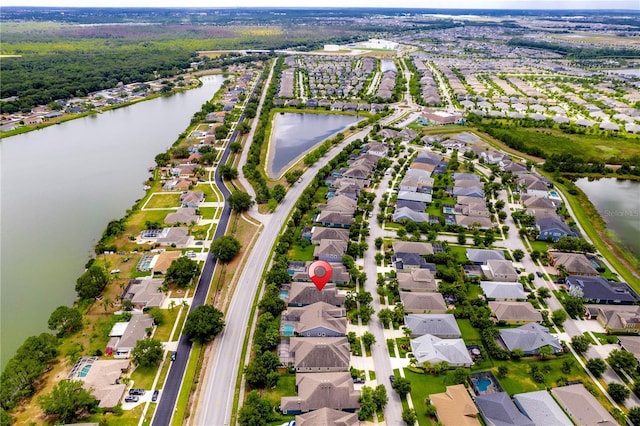 bird's eye view with a water view