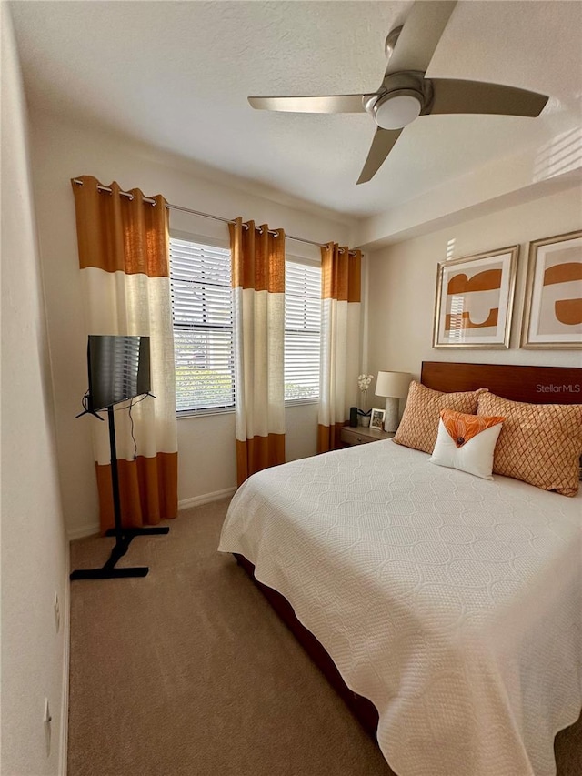 bedroom with carpet flooring and ceiling fan