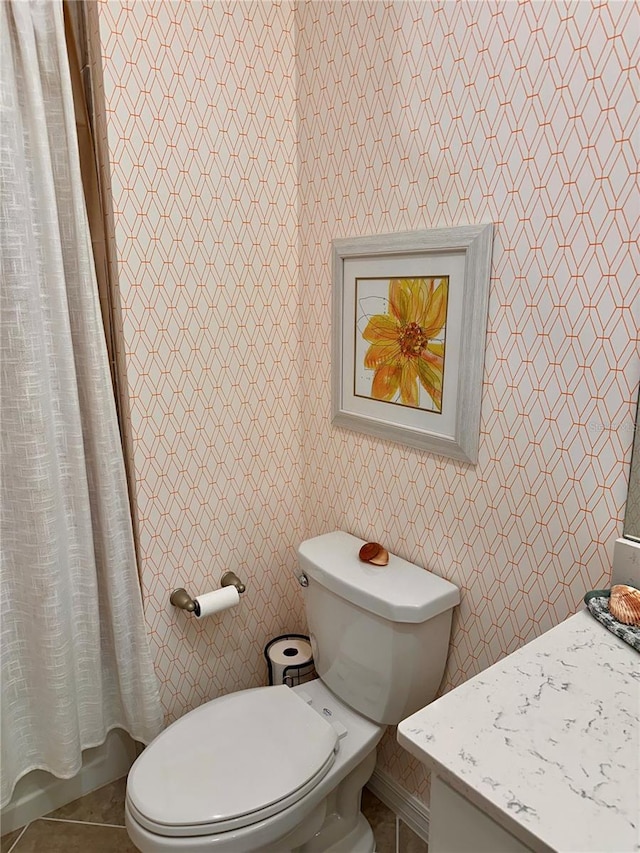 bathroom featuring walk in shower, vanity, and toilet