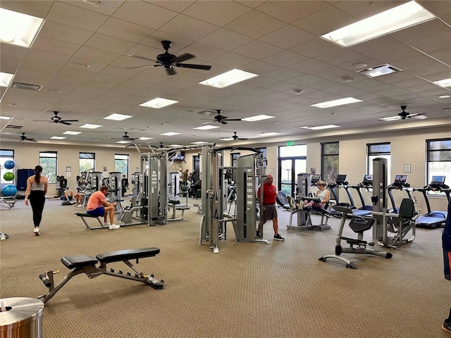 workout area featuring a paneled ceiling