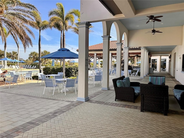 view of patio / terrace featuring ceiling fan