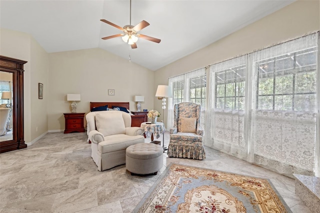 bedroom with ceiling fan and lofted ceiling