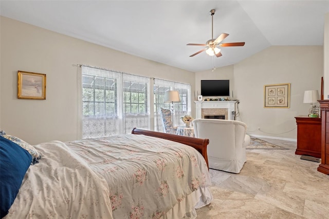 bedroom with ceiling fan and vaulted ceiling