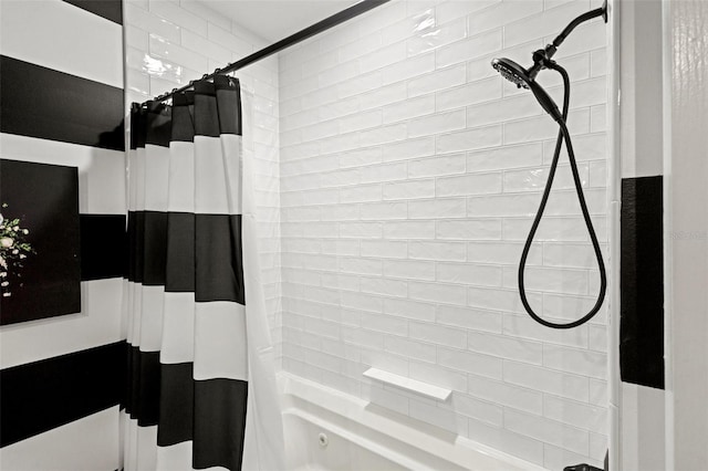 bathroom with shower / bathtub combination with curtain