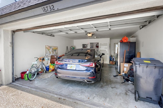 garage featuring a garage door opener