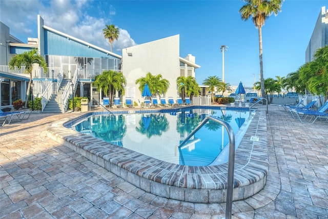 view of pool featuring a patio area