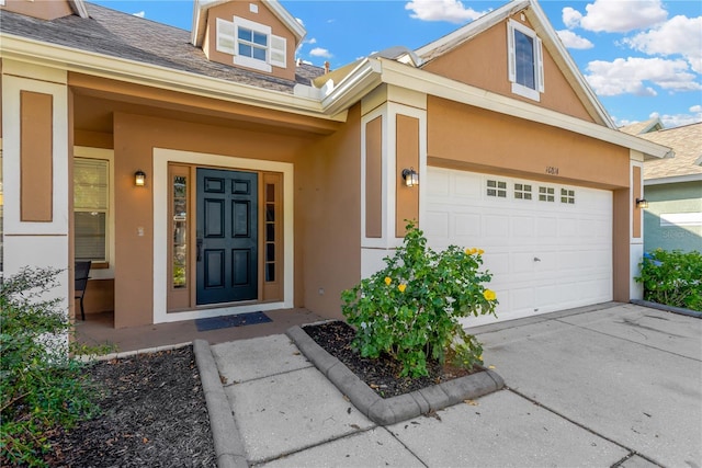 entrance to property with a garage