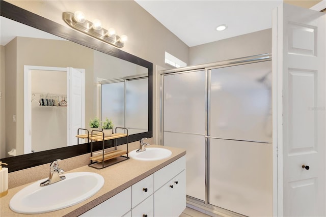 bathroom featuring vanity and walk in shower