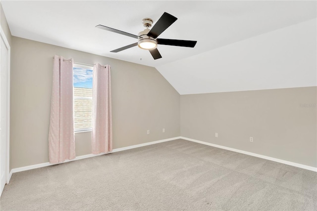 bonus room featuring light colored carpet, ceiling fan, and lofted ceiling