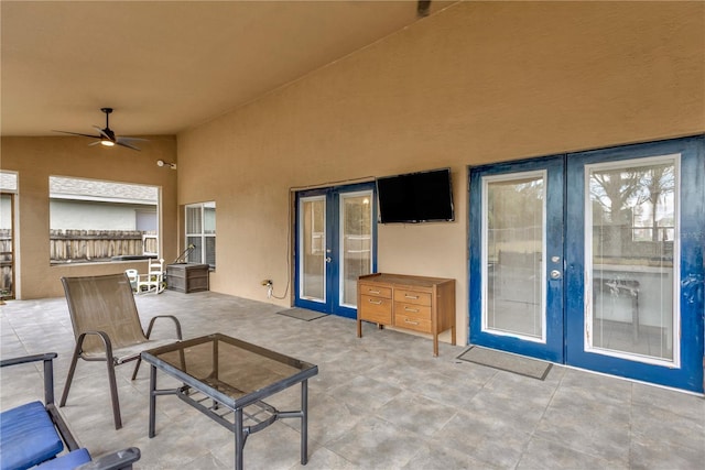 view of patio / terrace featuring ceiling fan and french doors