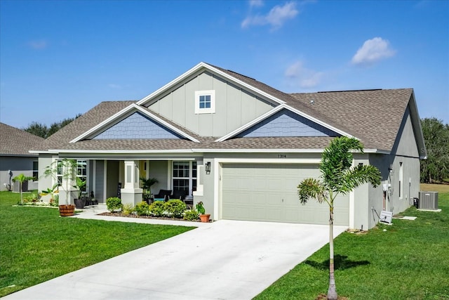 view of front of house featuring cooling unit, a porch, and a front yard