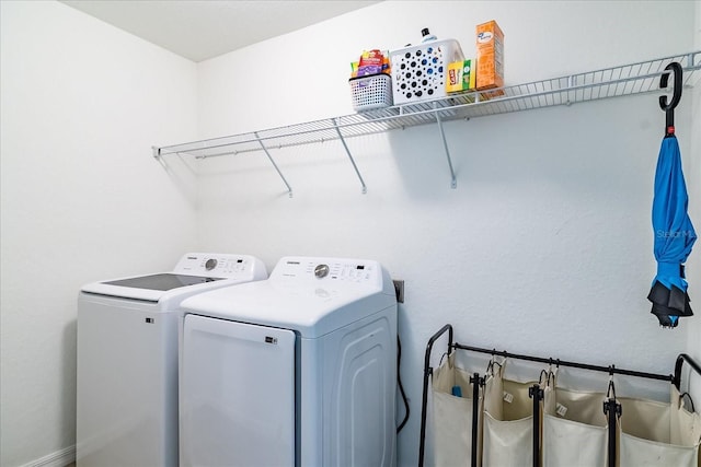 laundry area with washer and dryer