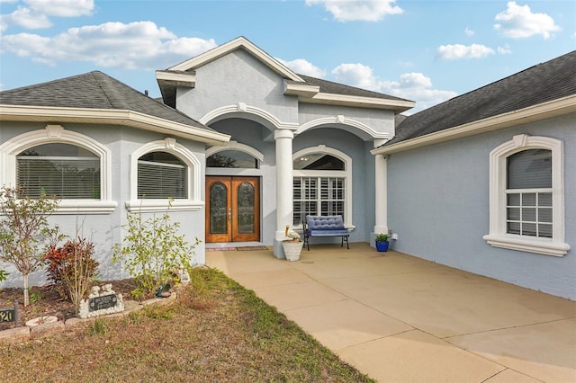 view of exterior entry with french doors