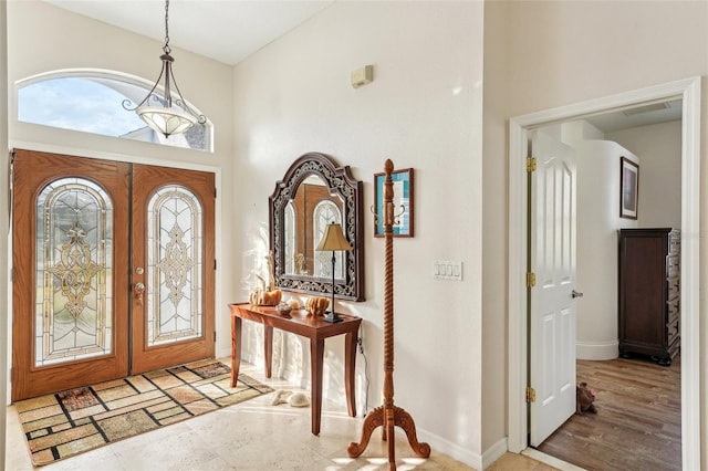 foyer entrance featuring french doors