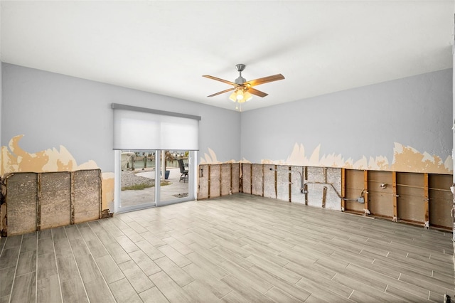 interior space featuring ceiling fan and light hardwood / wood-style flooring