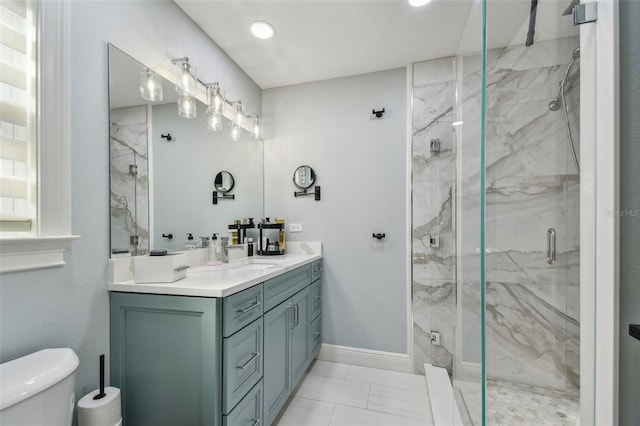 bathroom with vanity, an enclosed shower, and toilet