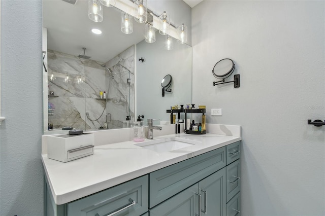 bathroom with vanity and an enclosed shower