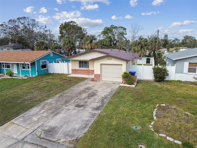 ranch-style house with a garage and a front lawn