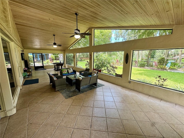 sunroom / solarium with ceiling fan, wooden ceiling, and vaulted ceiling