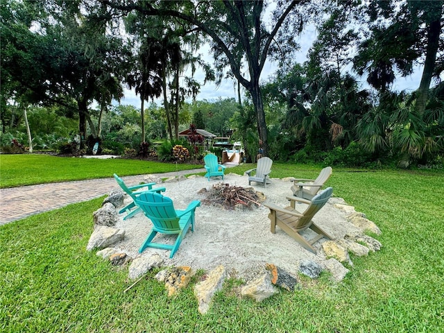 view of patio with an outdoor fire pit