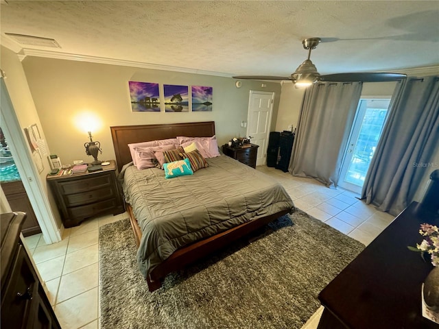 tiled bedroom with access to outside, ceiling fan, a textured ceiling, and ornamental molding