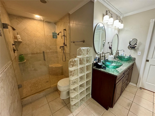 bathroom with tile patterned flooring, a shower with shower door, and crown molding