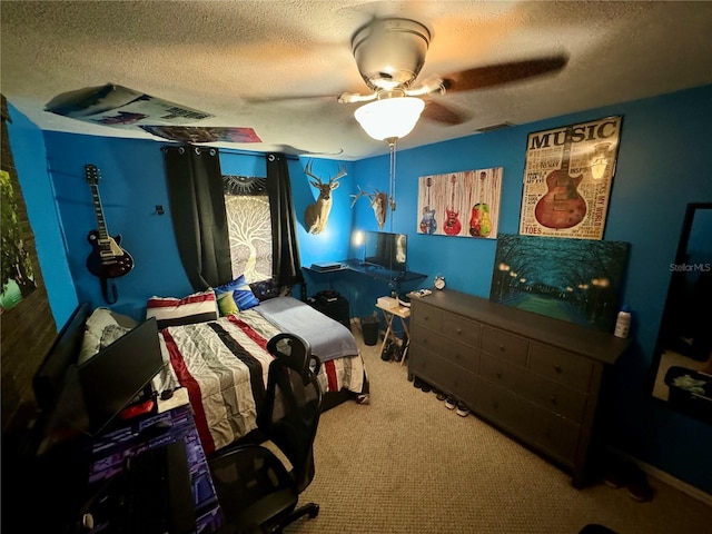 bedroom with carpet, a textured ceiling, and ceiling fan