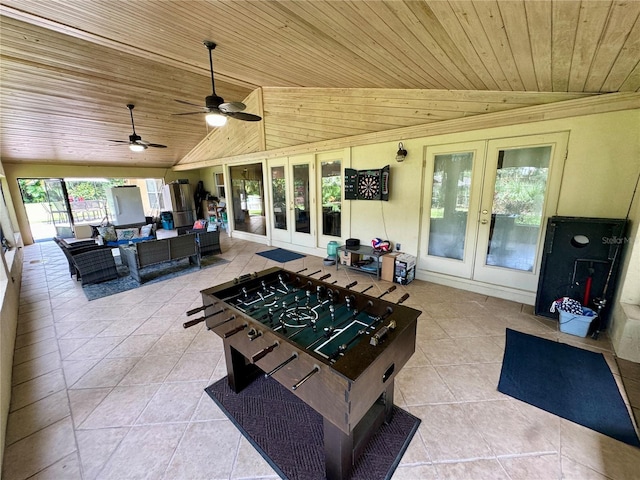 view of patio / terrace featuring an outdoor living space, ceiling fan, and french doors