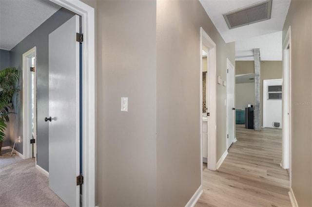 hall featuring light wood-type flooring