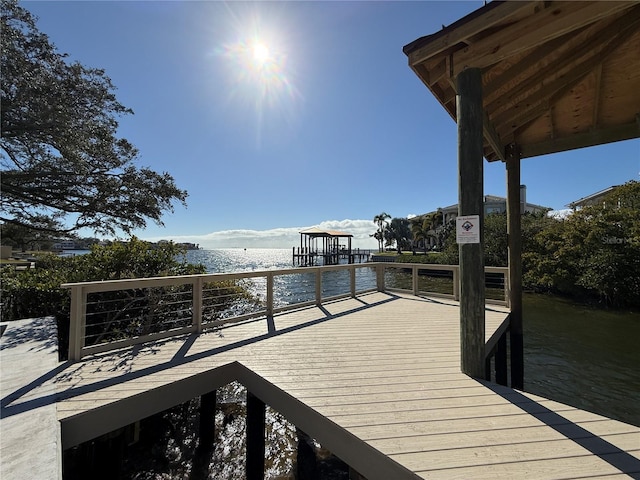 dock area featuring a water view