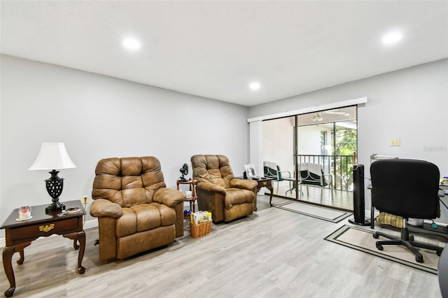 office with light wood-type flooring