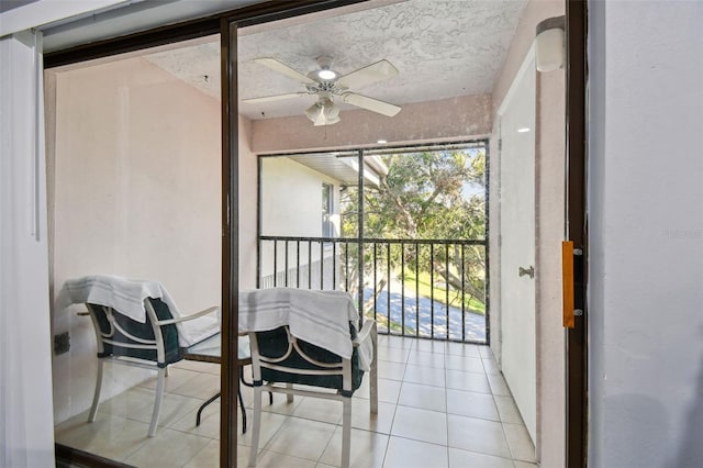 balcony featuring ceiling fan