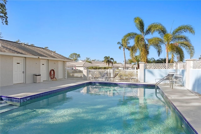 view of swimming pool featuring a patio