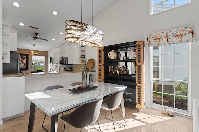 dining room with ceiling fan