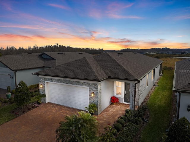 ranch-style house featuring a garage