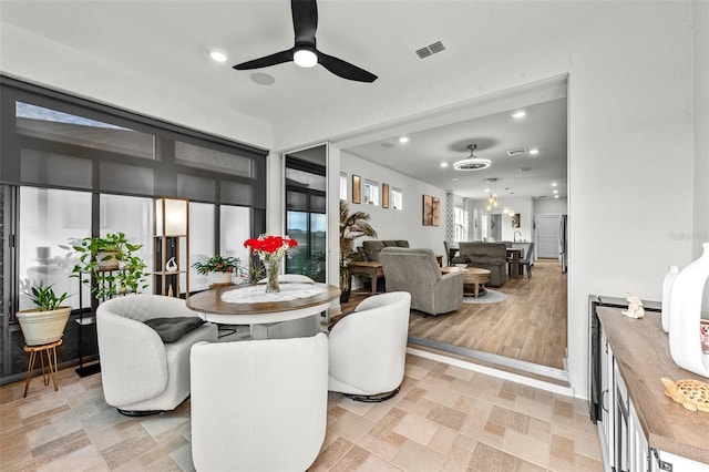 dining room featuring ceiling fan