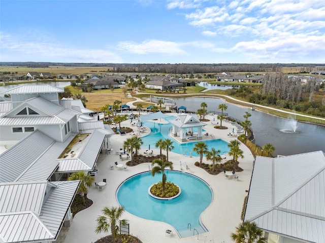 birds eye view of property featuring a water view