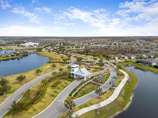 drone / aerial view with a water view