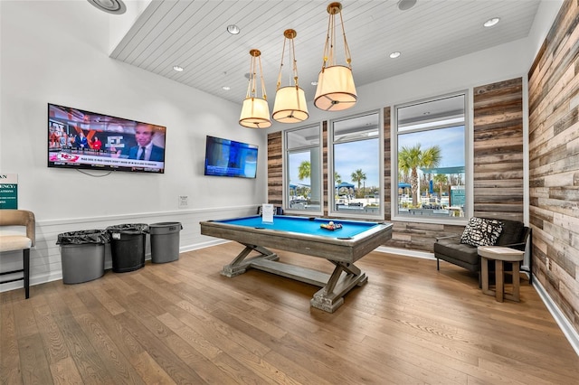 game room featuring wooden ceiling, hardwood / wood-style floors, pool table, and wood walls