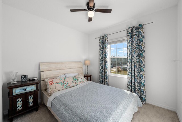 bedroom with carpet and ceiling fan