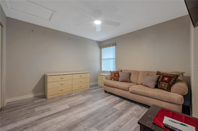 living room with ceiling fan and light hardwood / wood-style floors