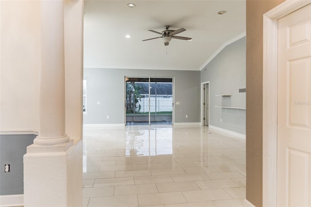 unfurnished room with ceiling fan, ornate columns, crown molding, and vaulted ceiling