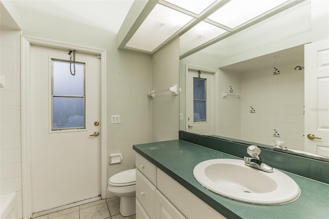 full bathroom with tile patterned flooring, vanity, toilet, and shower / tub combination