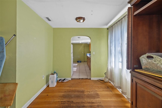 hall featuring light wood-type flooring