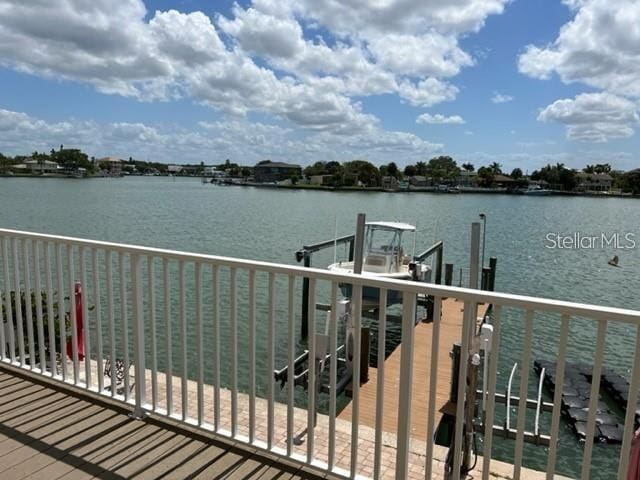 dock area with a water view