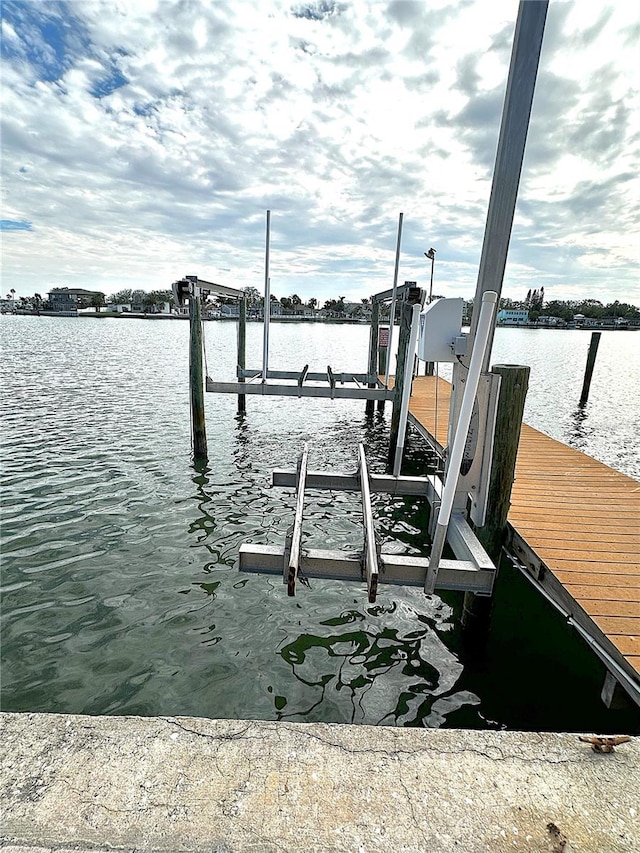 view of dock with a water view